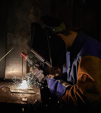Columbus State student practicing welding techniques.