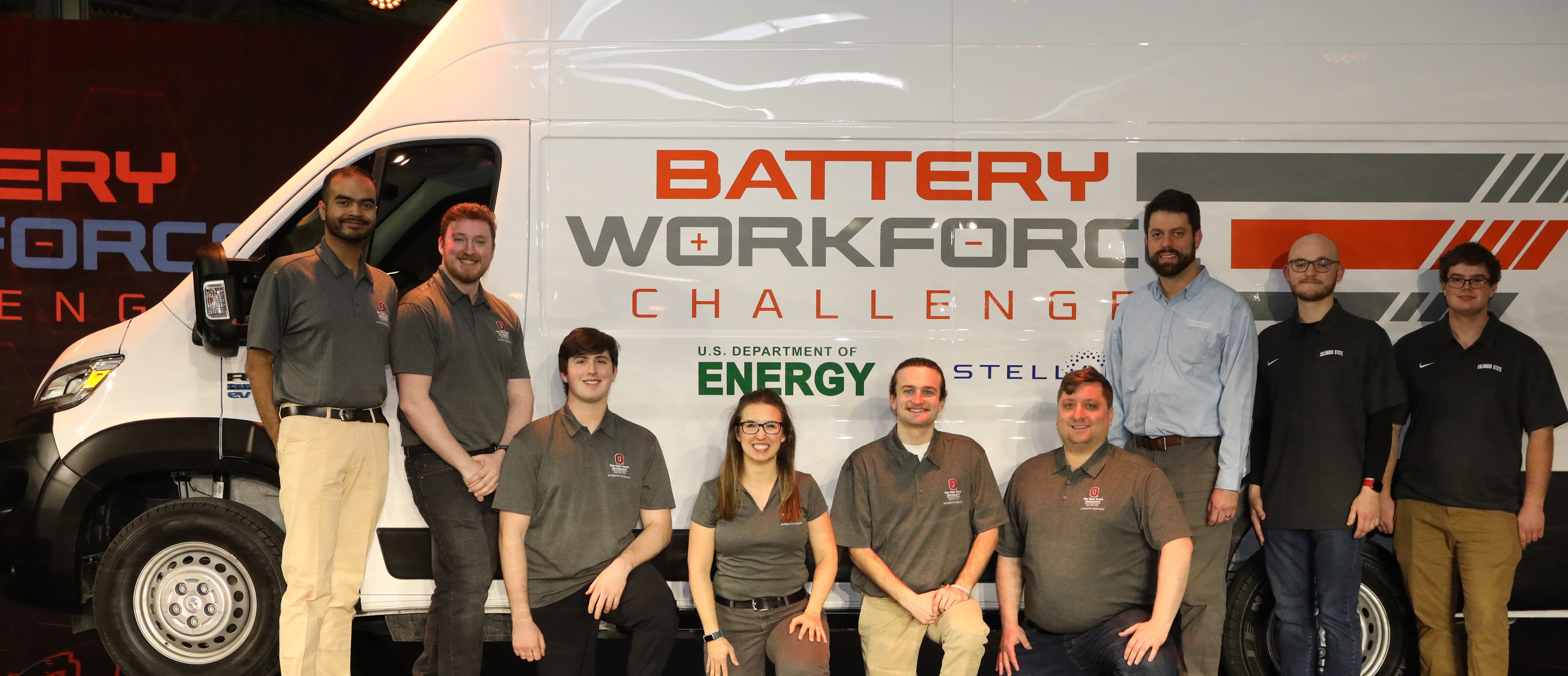 from right to left: students Russel Coughlin and Joe Borgerson and (in the blue shirt) Automotive Associate Professor Ian Andrews. The remainder of the group includes students and faculty from Ohio State University.