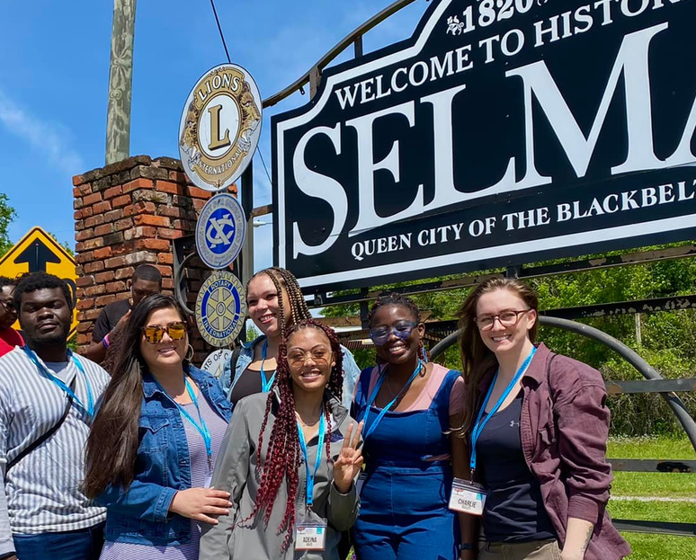 Students attending a previous bus tour.