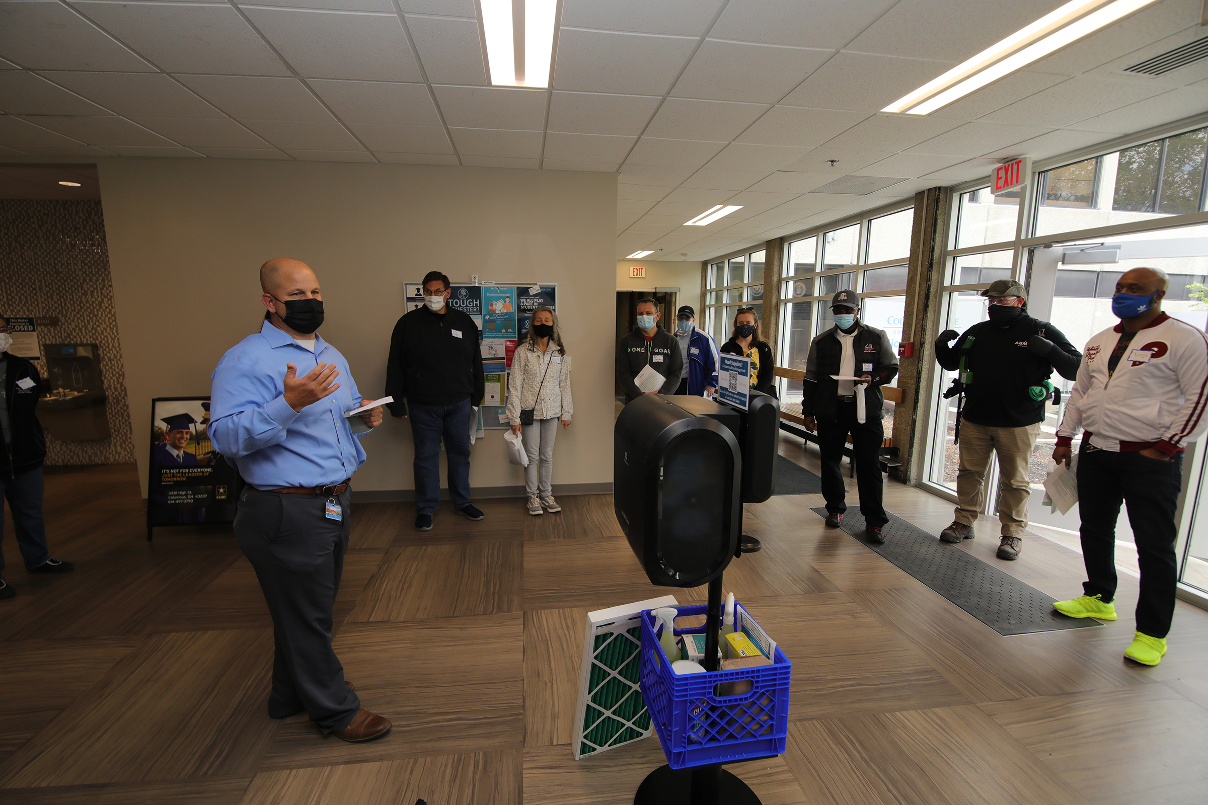 On the left, Mark Dudgeon, Facilities Management senior director, talks to faculty and staff on a tour of the Columbus Campus in the spring of 2021.