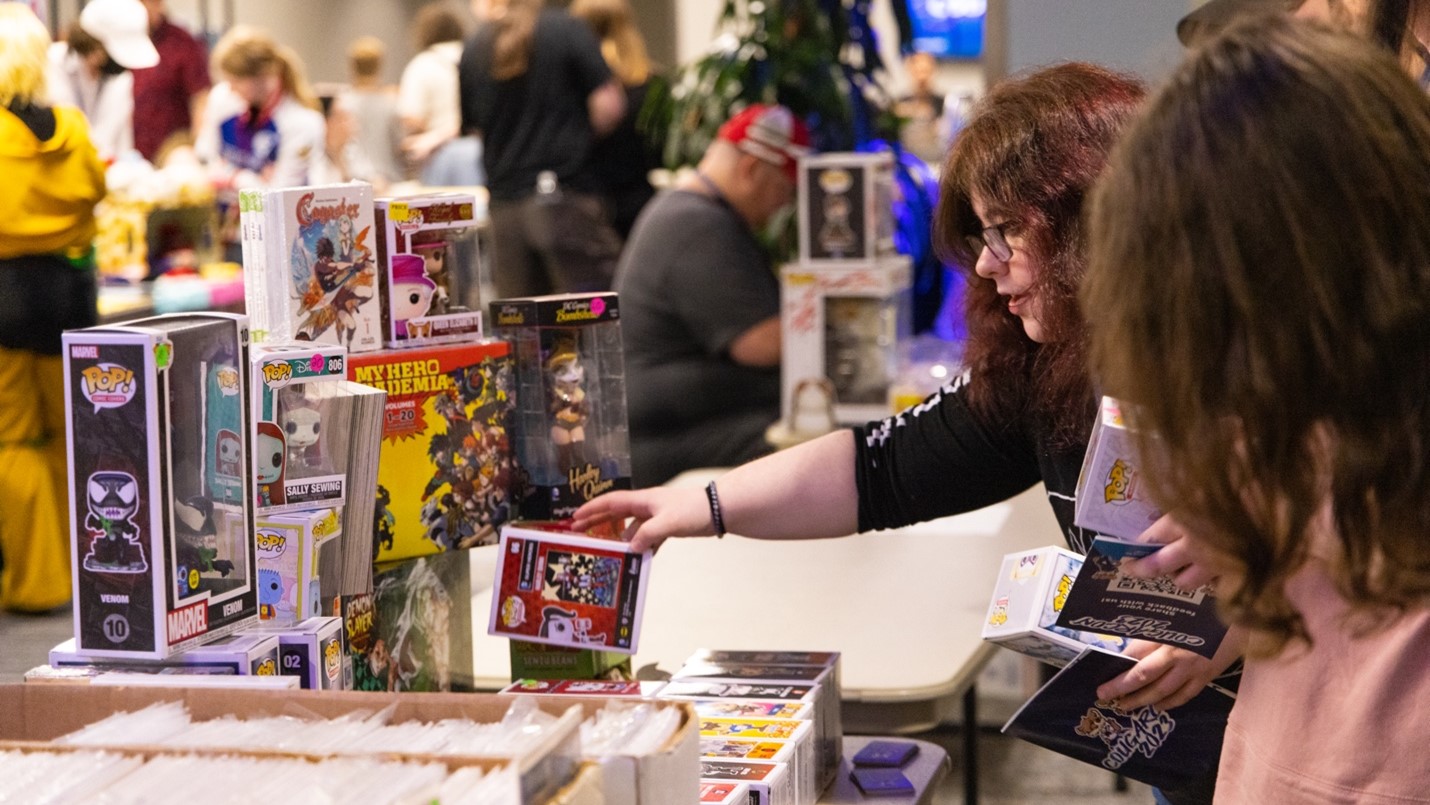 Attendees at the first Columbus State CougarCon browse the selection of memorabilia in the Vendor and Artist Alley.