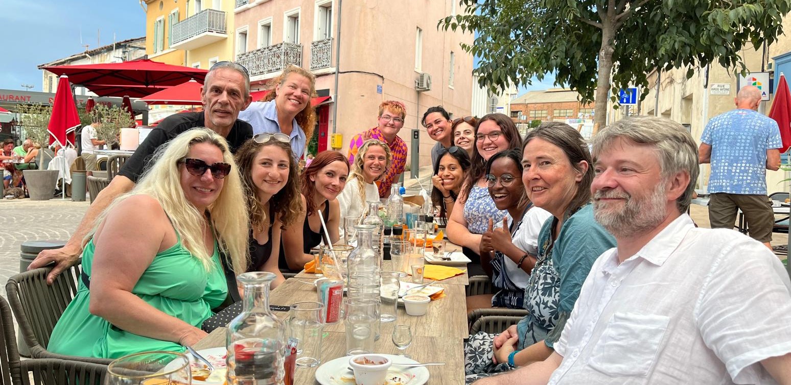 Columbus State student Brittany Blevins, standing at the very back of the table on the right, gathers with other international students and faculty at a dinner in Le Pecherie, France, on July 7 as part of a study abroad program.