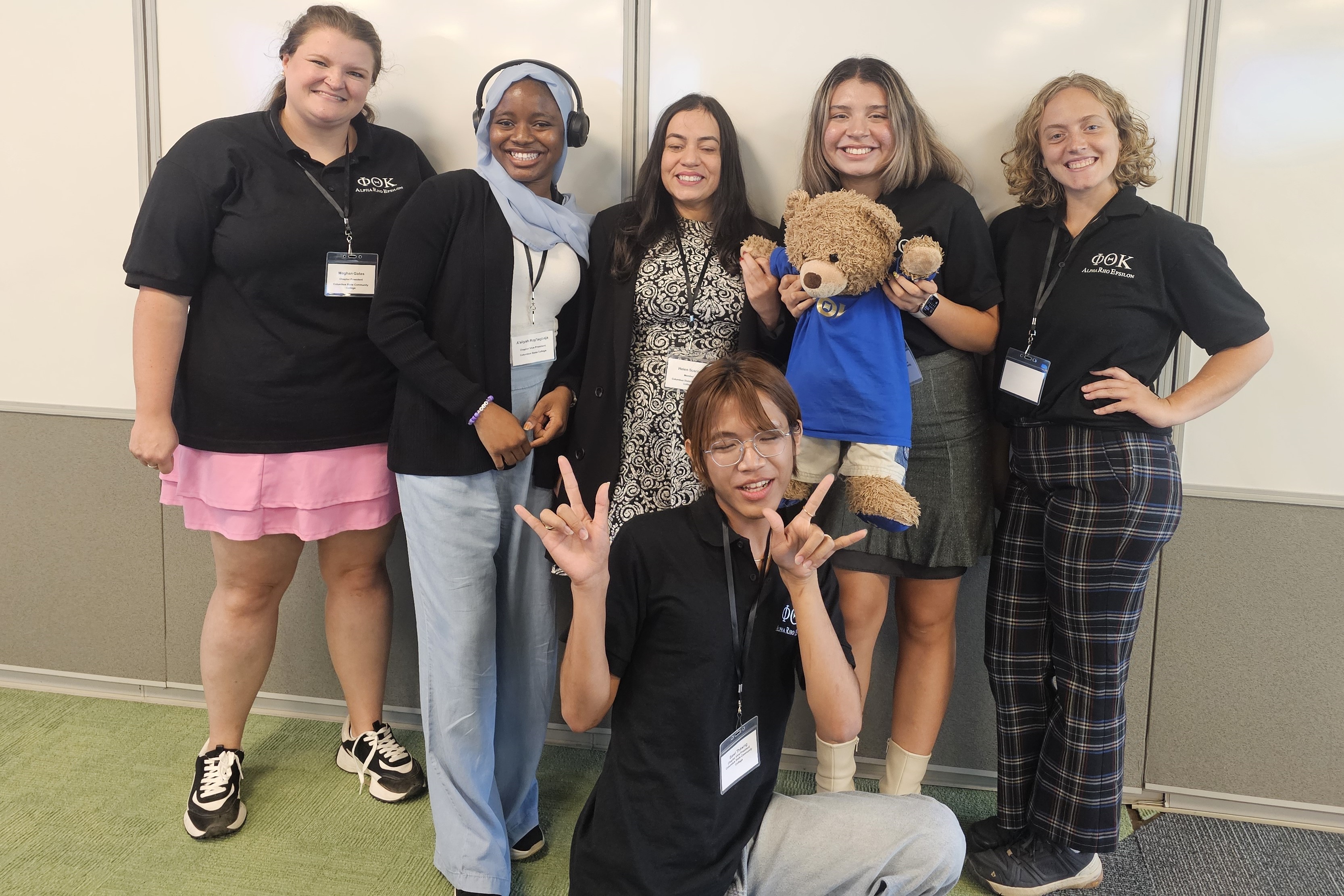 Pictured left to right: students Meghan Gates, Aaliyah Roy’lagbaja, Helen Soares, Valeria Castillo, and Haley Middendorf. Bawi Thawng is kneeling in front.