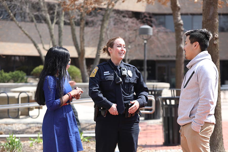 Officer with students