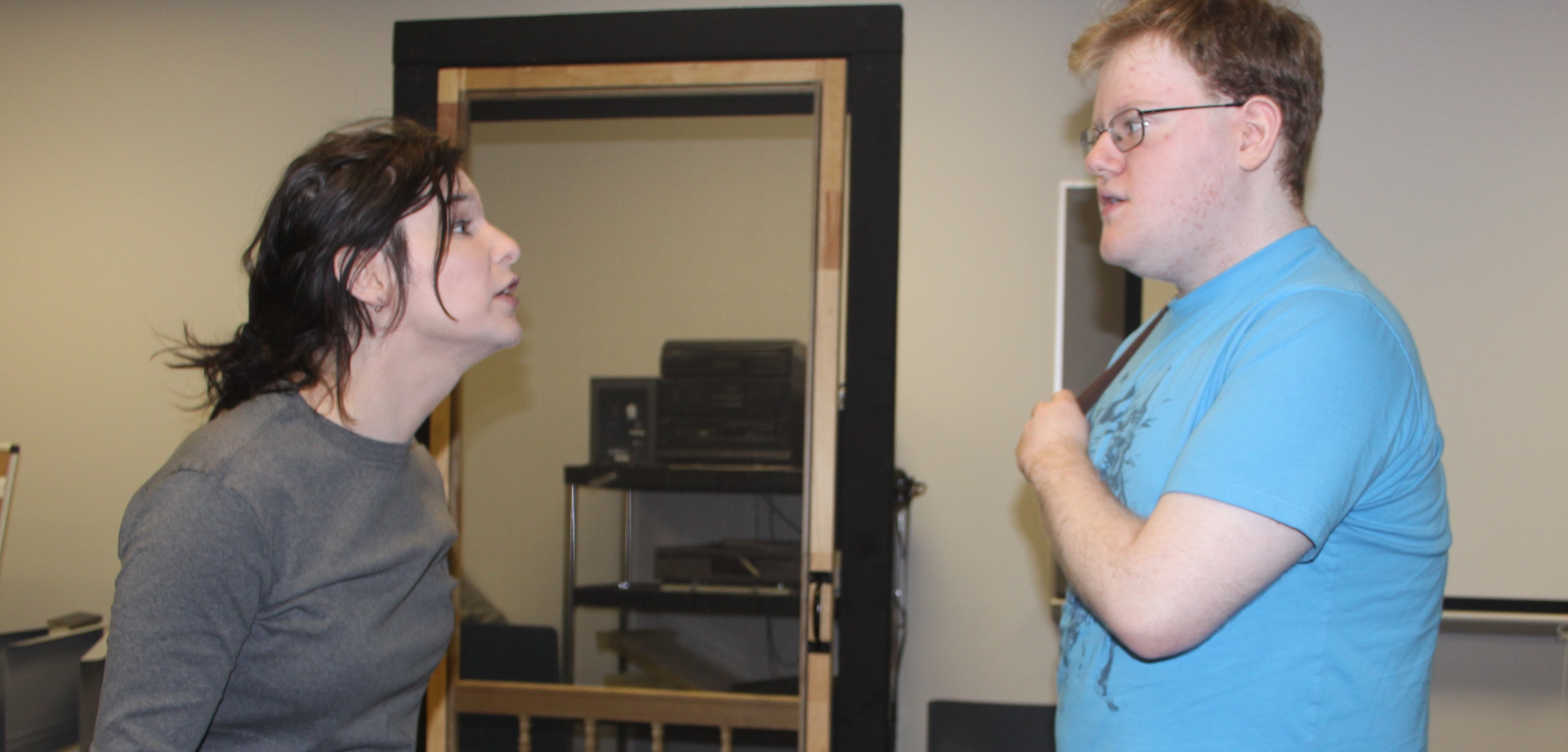 Columbus State students Reagan Hyer, on the left, and Will Settemberino, rehearse a scene from “Proof” on March 1
