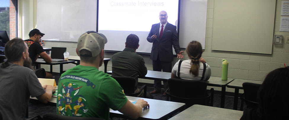 Instructor Seth Smith lectures during his interpersonal communication class on Sept. 8 in Phillips Hall.