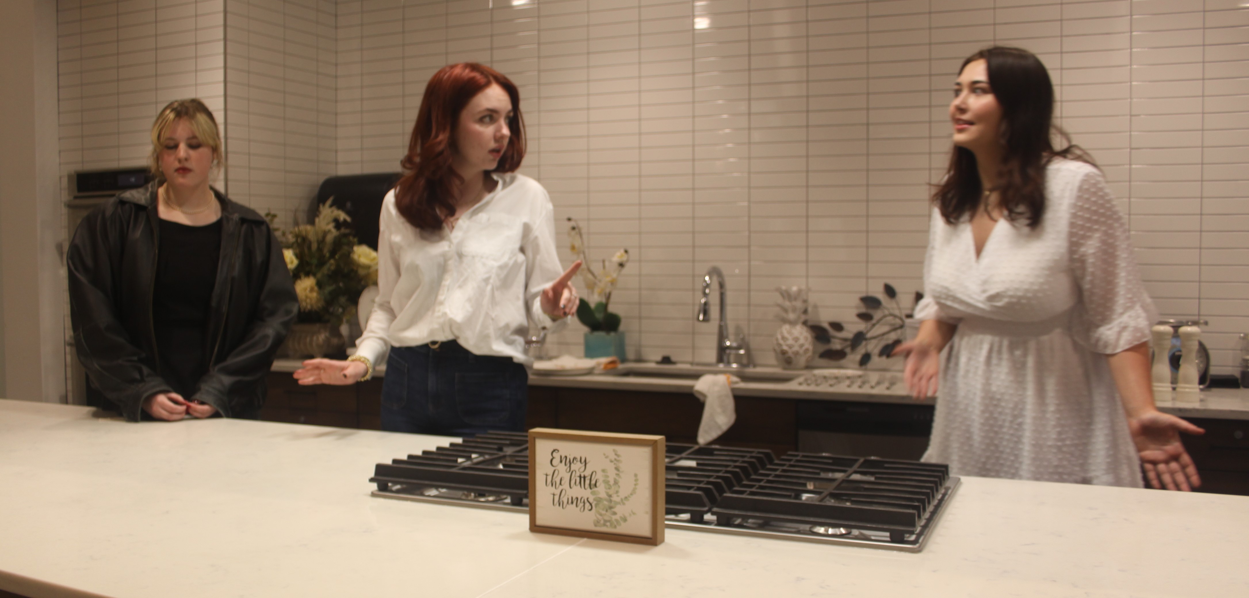 Students Corinne Brodley,  Blu Heckathorn, and Olivia Dauch rehearse on June 24 for “The Smell of the Kill” in Mitchell Hall at Columbus State Community College.