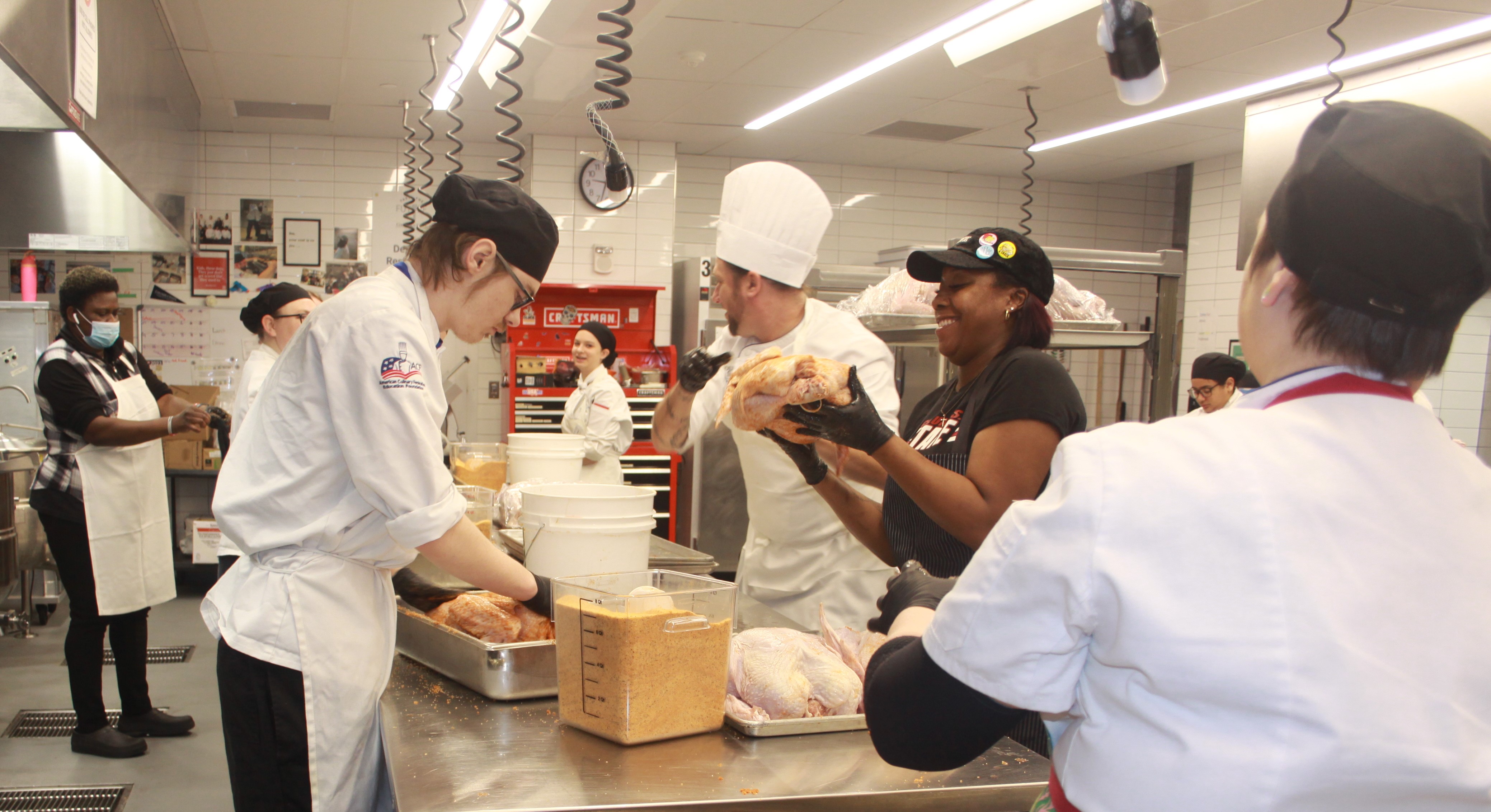 Staff and students from the School of Hospitality Management and Culinary Arts pitched in on Nov. 21, preparing 610 turkeys to raise funds for a local cancer research institute.
