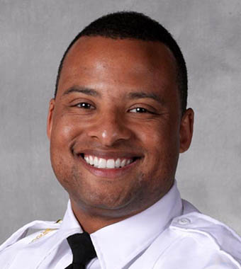 Sgt. James Fuqua smiling in uniform.