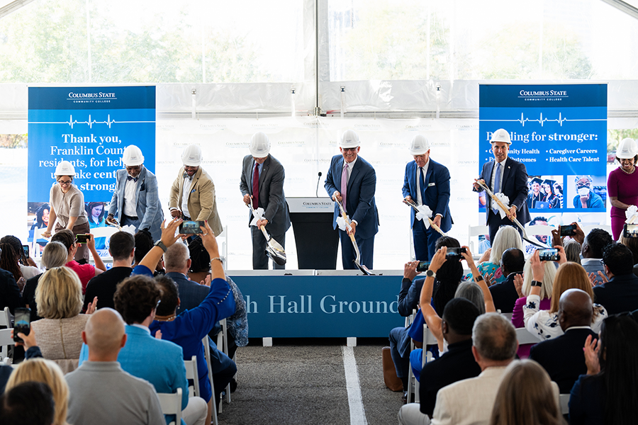 Columbus State President David T. Harrison, OhioHealth CEO Stephen E. Markovich, and other local dignitaries prepare to break ground.