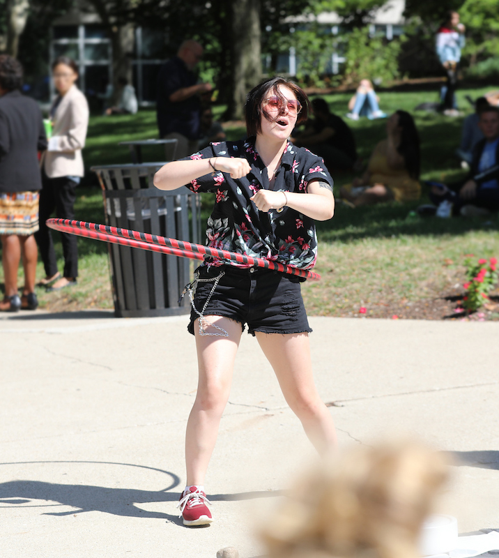 Student hula-hoops at Week of Welcome