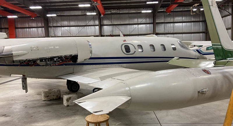 Lear 25D jet in hanger (formally owned by Willie Nelson).