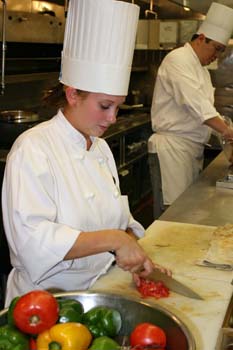 Student Chopping Tomatos