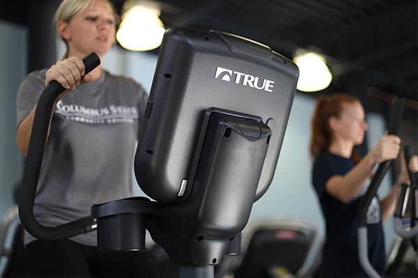 Photo of female using treadmill