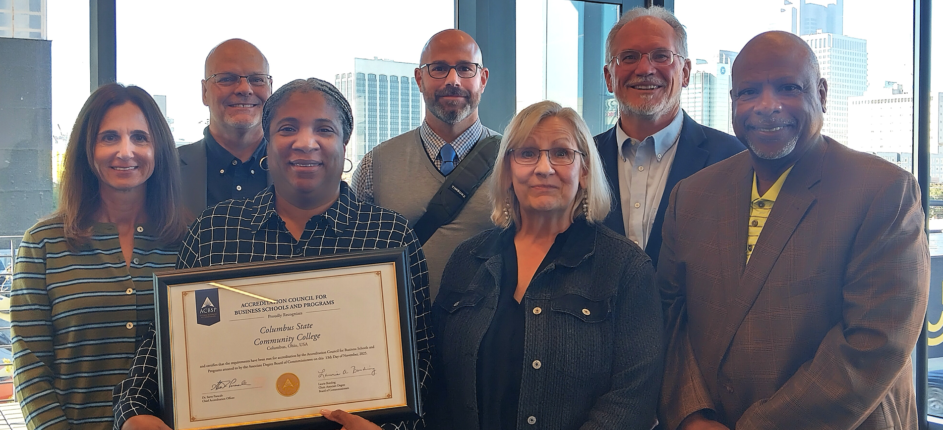 front row, left to right: Amy Popovich, Chavel Green, Charla Fraley, and Roger Ball. Back row: SVP and Chief Academic Officer Martin Maliwesky; Dean of Business, Engineering & Tech Mark Mahoney; and Duane Donaldson.