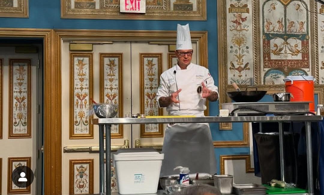 Chef Wickham preparing his winning dish on July 29 at the ACF National Conference.