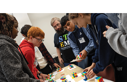 Photos from the We Are STEM event on November 18 2022. Students from area high schools come in for a morning to tour various STEM related labs and meet professors.