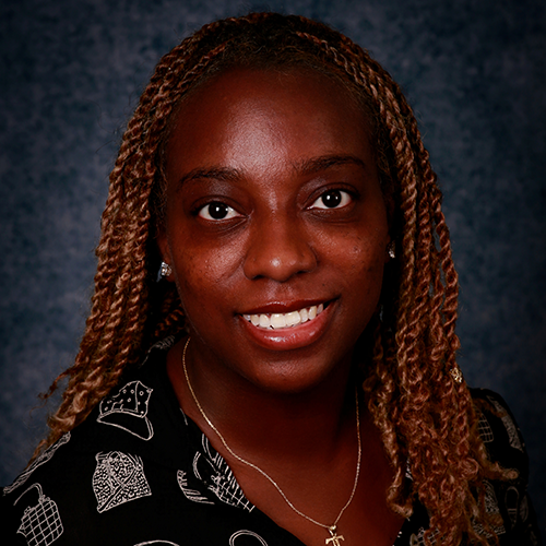 headshot of Taelor Seuell-Smith